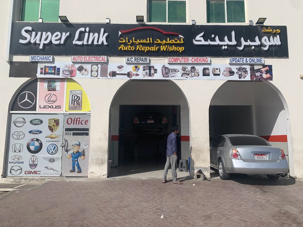 Super link auto repair Work shop oil , engine and paint Garage Abu dhabi.-wrshh swbr lynk krj,Tl zyt njn w tlwyn bw Zby